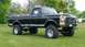 1979 Ford F-250 - Lifted 1979 Ford F-250 pickup truck with chrome accents and a bull bar on the front.