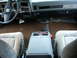 1988 Chevrolet Blazer - The interior of the vehicle shows significant water damage, with the floor covered in mud and debris.
