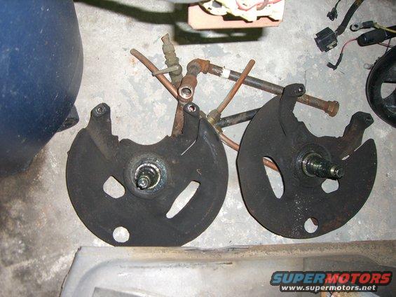 Pair of brake dust shields with copper lines and hardware