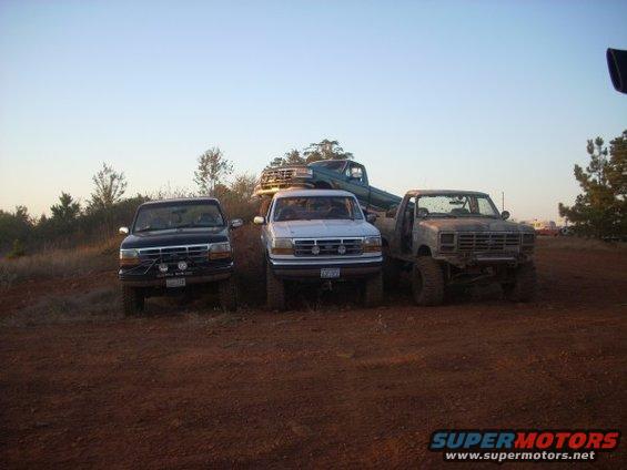 1992 Ford Bronco front view, black, lifted, with aftermarket bumper and lights