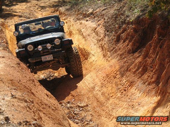 We were on a trail called Weenie World (4 diamond out of 5). After we got to the end of Weenie world, we intersected Clyde's Ravine, which was an awesome trail. The following pics are of our adventures crossing over to get going. 