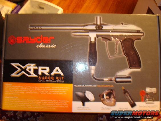 Spyder Xtra Super Kit paintball marker box with accessories including a loader, mask, and CO2 tank
