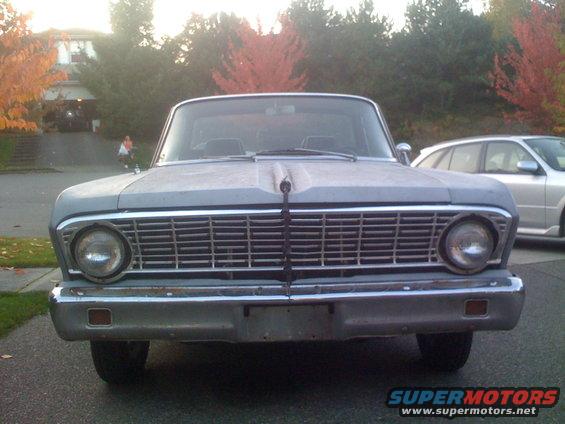 Front view of a 1963 Ford Falcon sedan with a chrome grille