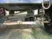 1988 Ford Bronco - Close-up of the front axle and suspension on a 1988 Ford Bronco.