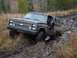 1988 Chevrolet Blazer - A driver navigates a muddy trail in a 1988 Chevrolet Blazer.