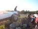 1998 Jeep Cherokee - Two Jeep Cherokees navigate a rocky obstacle course under a bright sun.