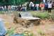 1972 Ford Bronco - Ford Bronco attempts to drive through a deep mud pit during an off-road event.