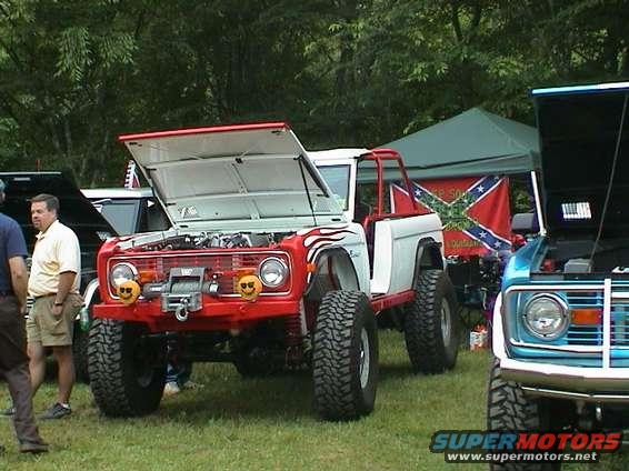 1972 Ford Bronco, front view, red and white with flames and winch