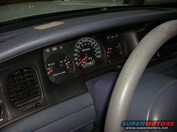 2001 Ford Crown Victoria dashboard showing speedometer, fuel gauge, and voltmeter