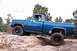 1979 Chevrolet C/K Pickup - This blue 1979 Chevrolet C/K Pickup is shown navigating a rocky off-road trail.