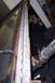1976 Ford Bronco - This is a close-up of a rusted metal channel with rivets, possibly from a vehicle part.
