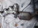 2002 Chevrolet Camaro - Exhaust manifold and catalytic converter assembly, likely removed from a vehicle.