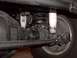 1978 Ford Bronco - Underside view of a vehicle's rear axle, suspension, and shock absorber system.