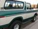 1978 Ford Bronco - This 1978 Ford Bronco is shown from the side, a two-tone paint scheme and chrome accents.
