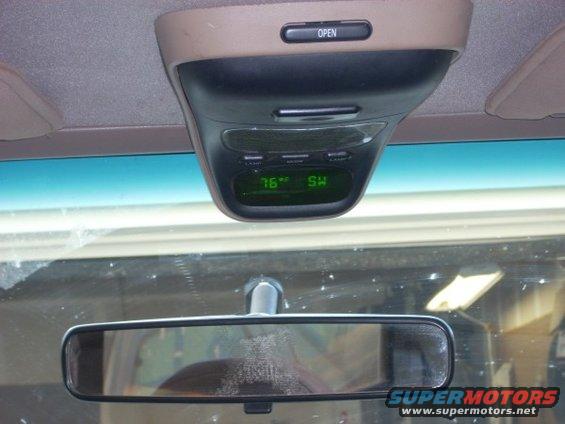 Overhead console with digital display showing temperature and compass direction