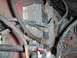 1989 Chevrolet Blazer - Close-up view of an engine component with electrical wiring and a metal heat sink.