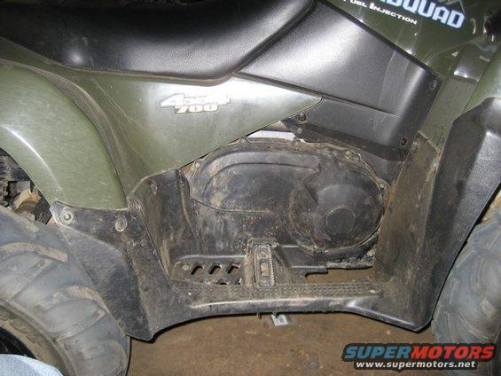 Green ATV side view showing the 4x4 700 badge and CVT cover