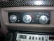 1993 Ford Bronco - Climate controls and CB radio visible in the interior of a vehicle.