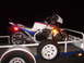1985 Honda Interceptor - A white and blue Honda motorcycle with red accents is secured to a trailer.