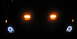2003 Ford Focus - Hella Optilux fog lights with halos lit up.