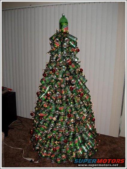 Christmas tree made of green Mountain Dew cans and red ornaments, topped with a large bottle