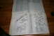 1996 Ford Bronco - A vehicle repair manual is open to pages with detailed diagrams and part lists for mechanical components.