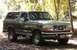 1996 Ford Bronco - This gray Ford Bronco from the 1992-1996 model years is shown from the front three-quarter angle.