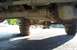 1978 Ford Bronco - Dana 44 Axle truss. Didn't loose any ground clearance in my mind, and it takes one hell of a pounding.