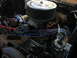 1978 Ford F-250 - Close-up of an engine bay, focusing on the air cleaner and carburetor assembly.