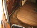 1978 Ford F-250 - Interior view of a 1978 Ford F-250, highlighting the brown vinyl bench seat and carpet.