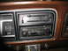 1978 Ford F-250 - The interior of a 1978 Ford F-250 shows the dashboard with a JVC radio and climate controls.