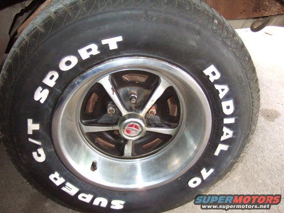 Has factory sport wheels & good tires