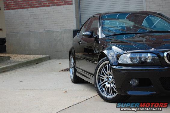 Black 2002 BMW M3 coupe parked outdoors, front quarter view