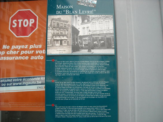 Document with text and historical images of buildings, including a stop sign