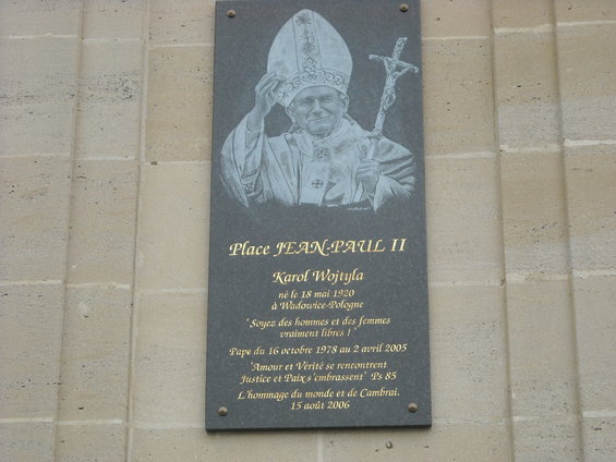 Plaque with Pope John Paul II's image and text about his life and legacy