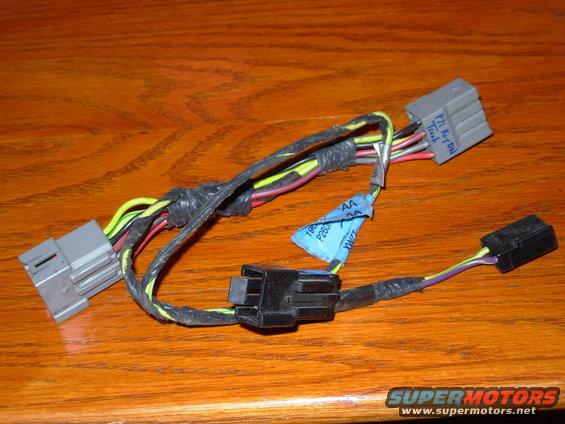 trunkhrns.jpg Factory harness to make the door trunk button work only with the key on.