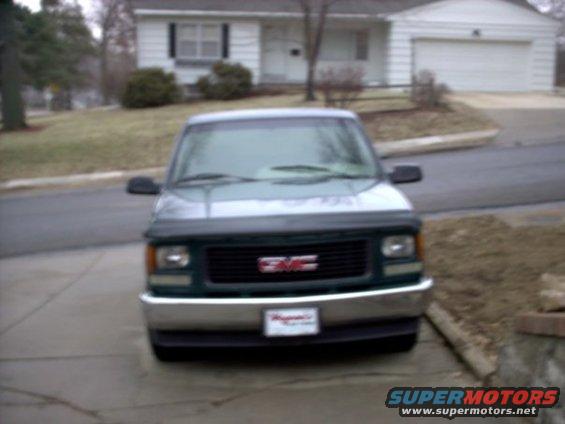 Front view of a 1995 GMC Sierra 1500 parked in a driveway