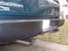 1995 GMC Sierra 1500 - Rear view of a 1995 GMC Sierra 1500 pickup truck, showing the bumper and dual exhaust pipes.