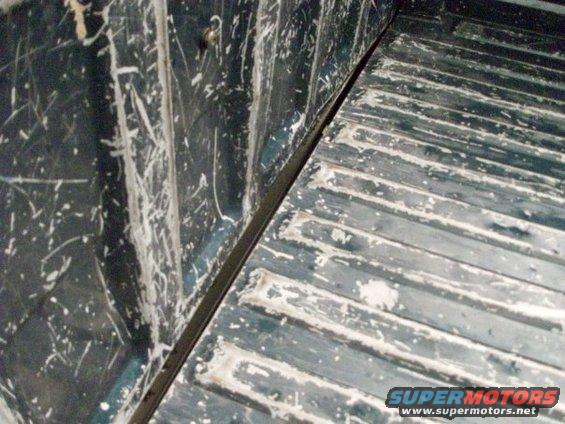 1995 GMC Sierra 1500 truck bed interior showing wear and tear
