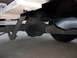 1995 GMC Sierra 1500 - Close-up of the rear axle assembly and suspension components of a truck.
