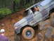 1989 Ford Bronco - Bronco navigates a difficult rocky obstacle during an off-road excursion.
