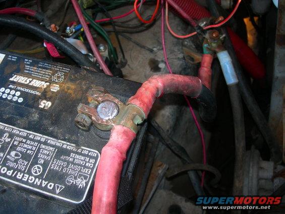 dscn1858.jpg For some reason, this harness came with a short stubby cable from the " " terminal.  Im not sure how it worked, but I have it patched to work.