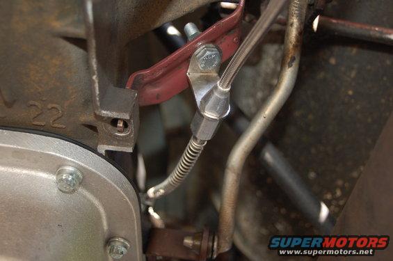 Lowere throttle valve cable linkage at transmission
