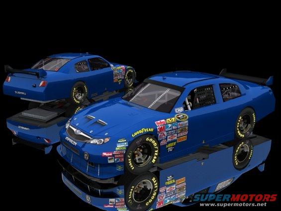 Two blue Subaru Impreza race cars with numerous sponsor decals and racing tires