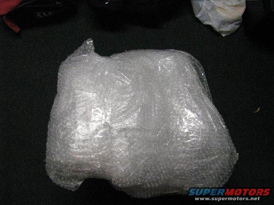 Engine intake manifold wrapped in bubble wrap