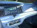2001 Ford Crown Victoria - Interior view of a 2001 Ford Crown Victoria dashboard, showing the radio and climate control panel.