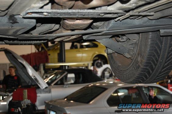 Underbody of a 2002 BMW M3, showing suspension and tire