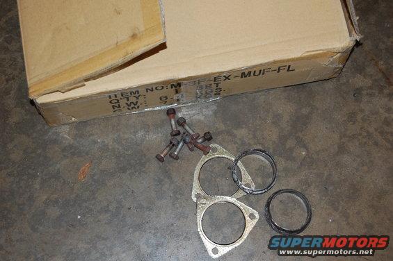 Exhaust gaskets and bolts with a cardboard box labeled 'ITEM NO: M3-3F-EX-MUF-FL'