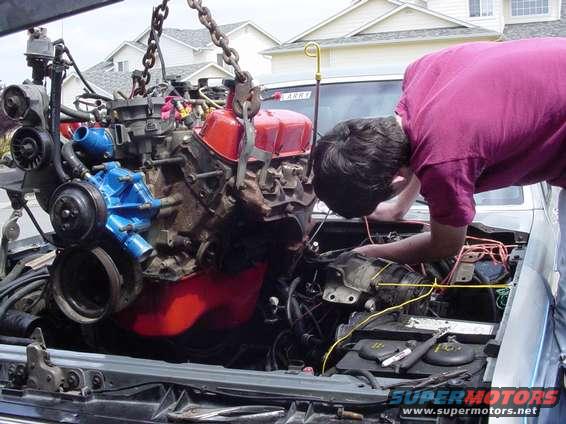 computer_006.jpg pulling back the mess of wires to get the beast under the hood