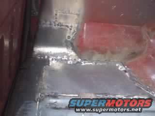 welded metal floor pan with SuperMotors.net watermark